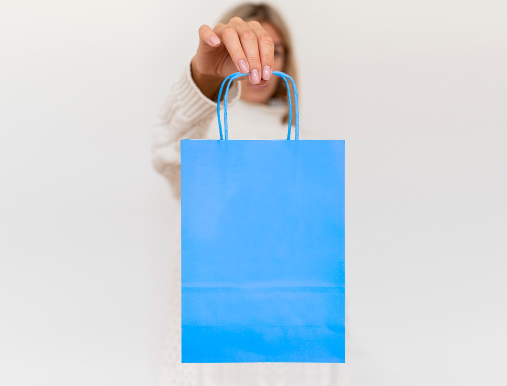 BOLSA PAPEL Q-CONNECT CELULOSA CELESTE L CON ASA RETORCIDA 320X400X140 MM