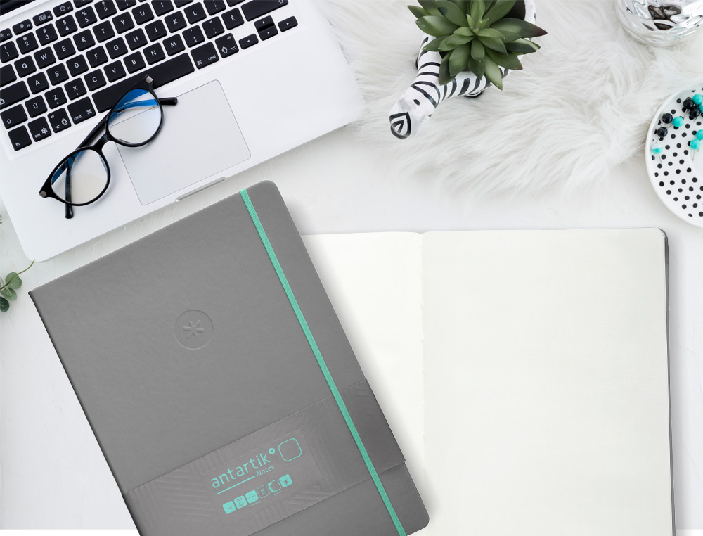 CUADERNO CON GOMILLA ANTARTIK NOTES TAPA DURA A4 HOJAS LISAS GRIS Y TURQUESA 100 HOJAS 80 GR FSC