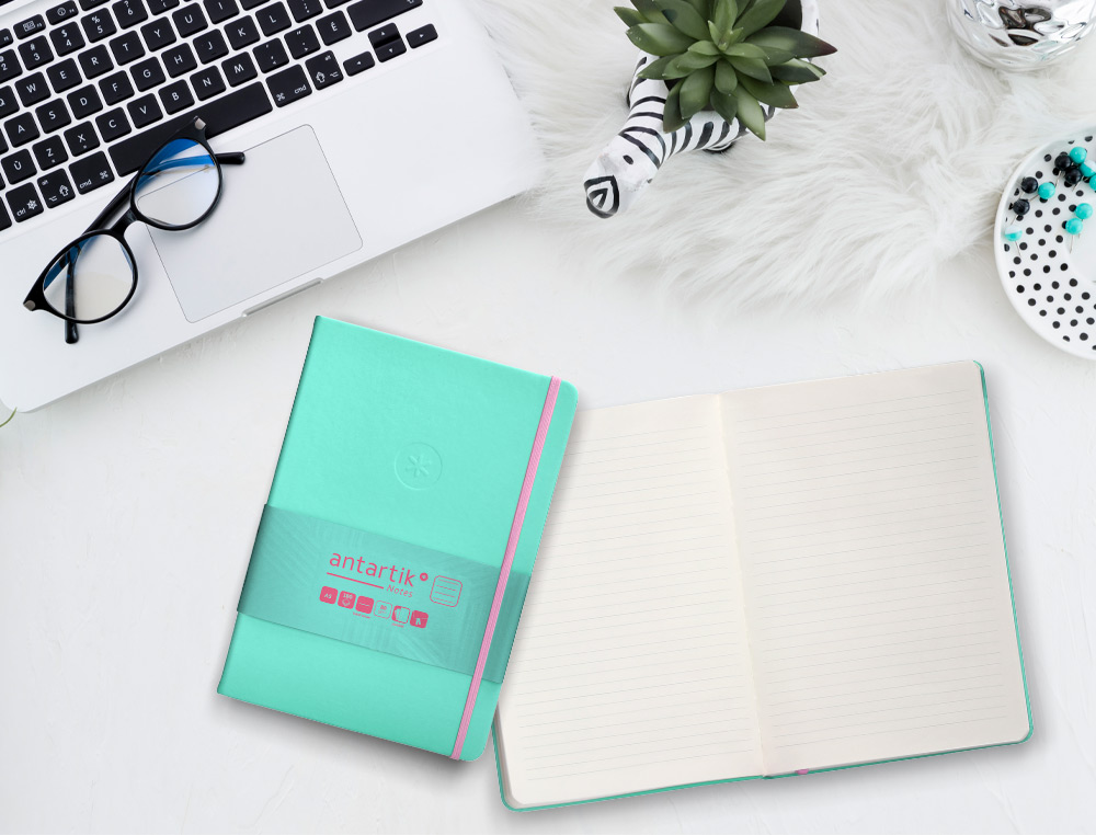 CUADERNO CON GOMILLA ANTARTIK NOTES TAPA DURA A5 HOJAS RAYAS ROSA Y TURQUESA 100 HOJAS 80 GR FSC